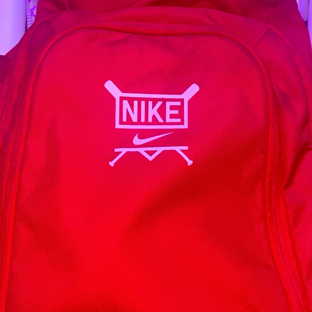 Red NIKE ball sports bag.